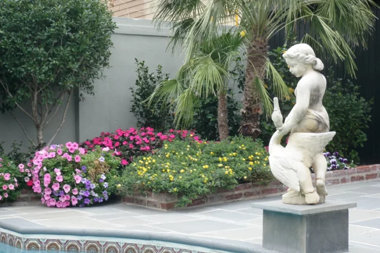 Angel statue flanks French Quarter pool