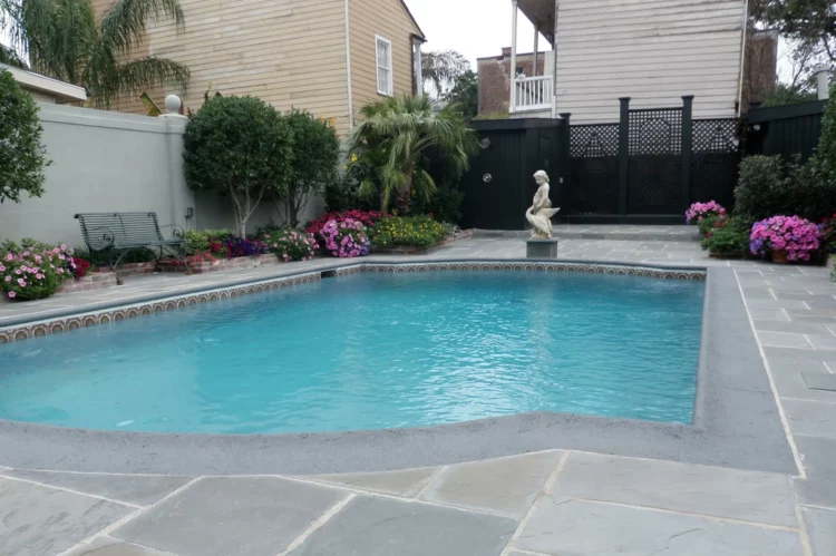 Blue flagstone surrounding French Quarter pool