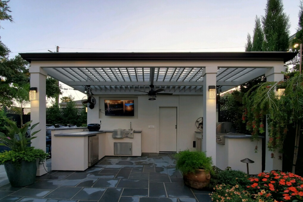 modern pergola with gutters & sconce lighting